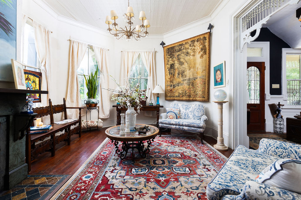 Formal parlor with antique tapestry and chandelier